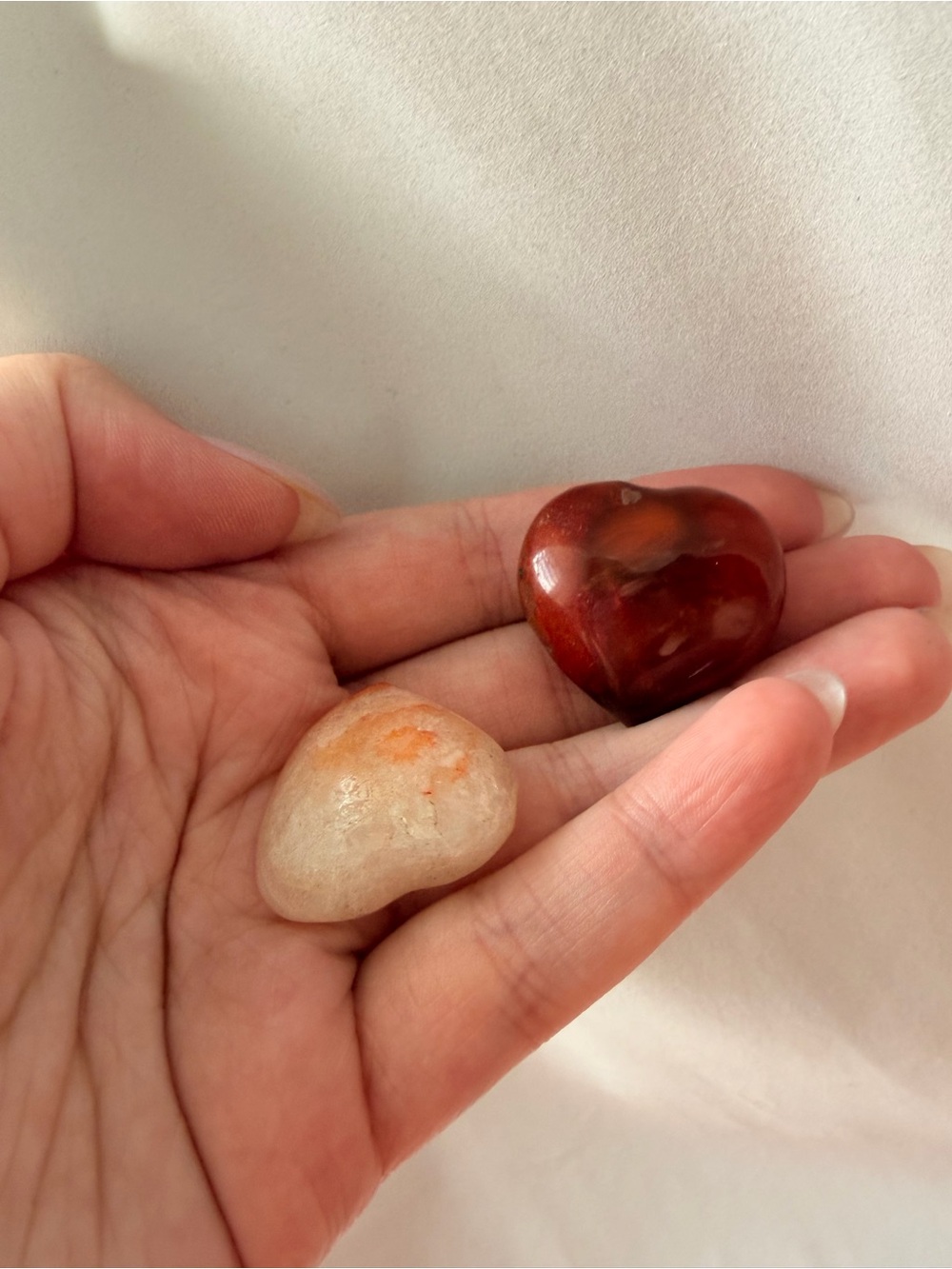2 crystal heart carvings